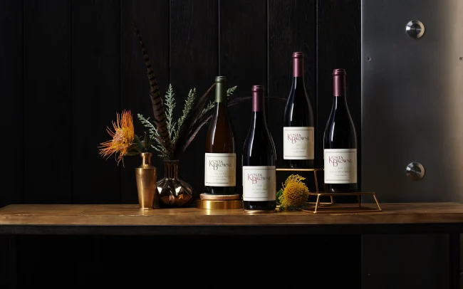 Lineup of Kosta Browne wine bottles