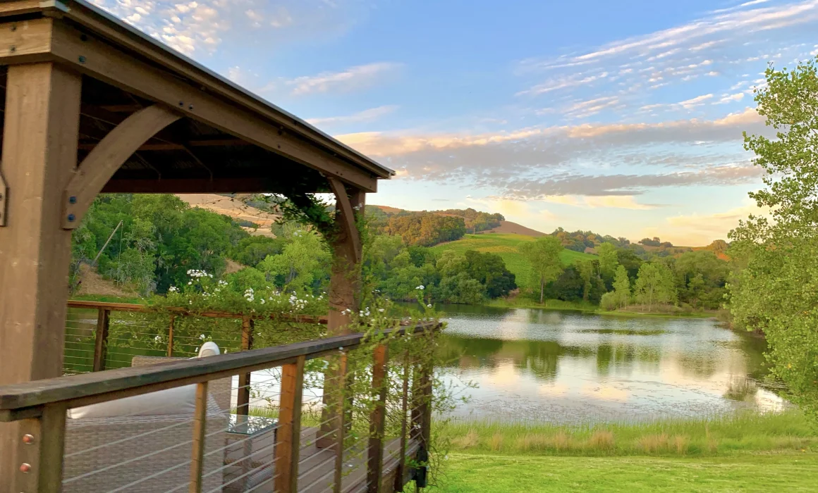 Wine tasting pavilion with a view of the lake at Notre Vue Estate