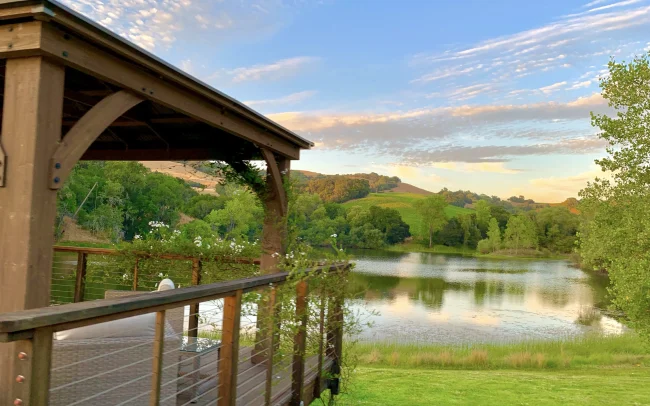 Wine tasting pavilion with a view of the lake at Notre Vue Estate