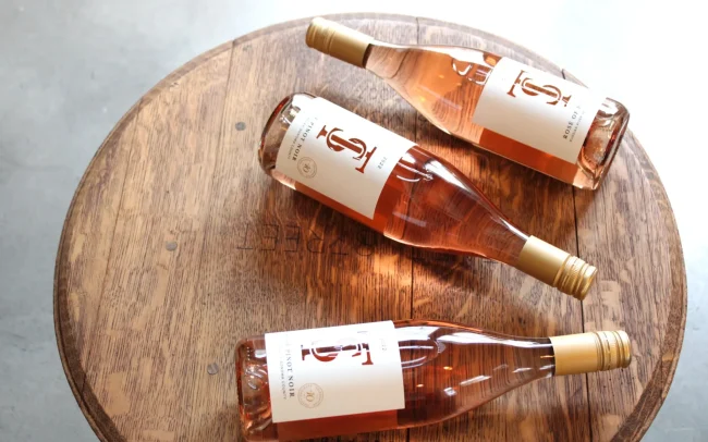 Taft Street Winery bottles on a barrel top