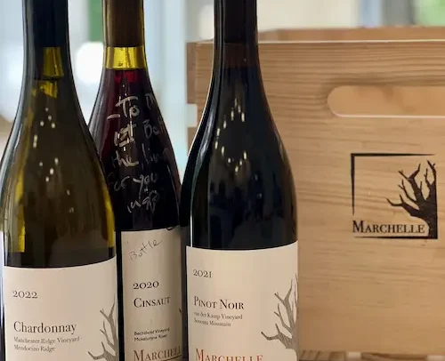 Three bottles of Marchelle Wine