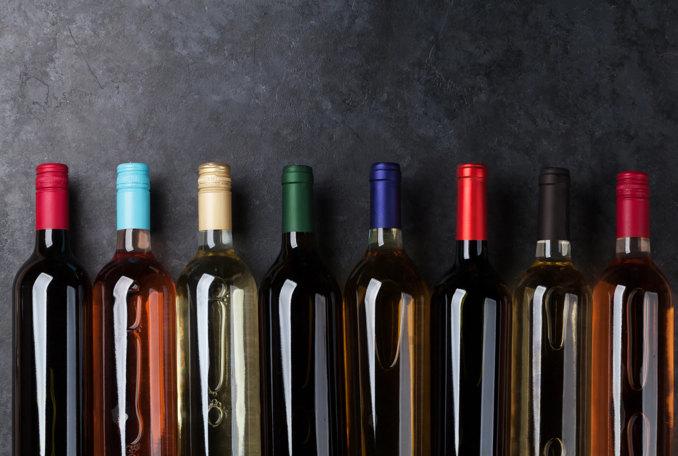 red-rose-and-white-wine-bottles-2024-11-25-18-58-51-utc Wine bottles in many colors